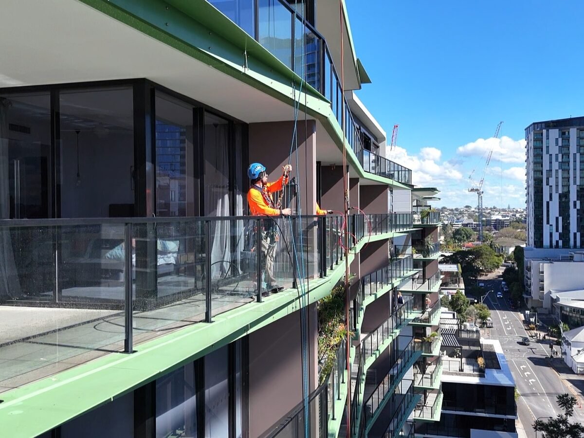 Rope access balcony glass cleaning at 9 Edmondstone St, South Brisbane